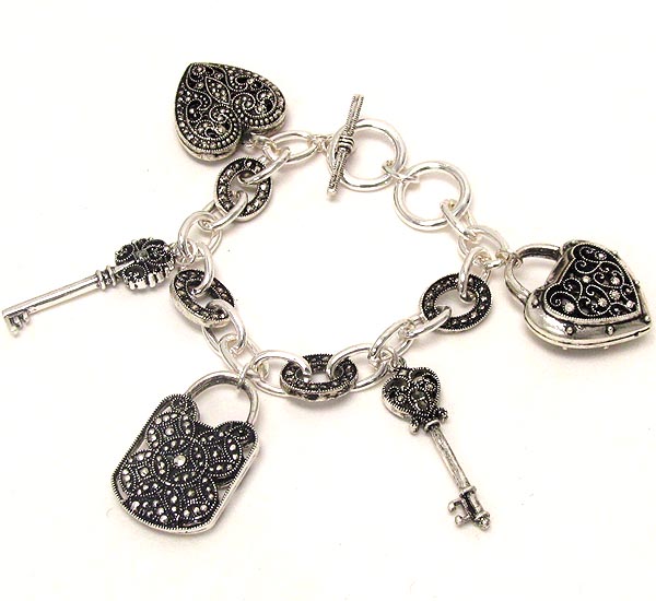 Marcasite style key and lock theme charm bracelet