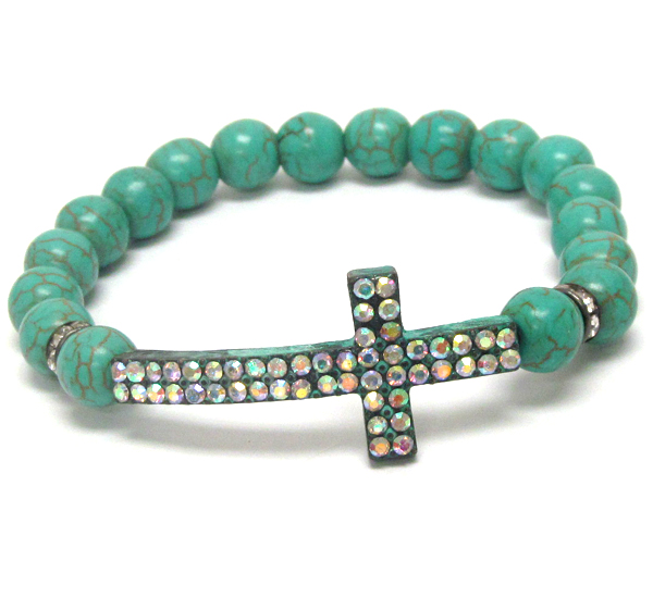 Crystal cross and turquoise ball stretch bracelet