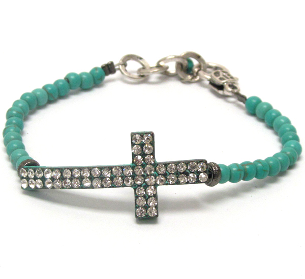 Crystal cross and turquoise ball bracelet