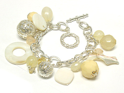 Natural shell disk charm bracelet