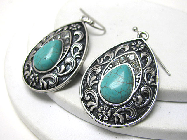 Turquoise accent textured metal earring