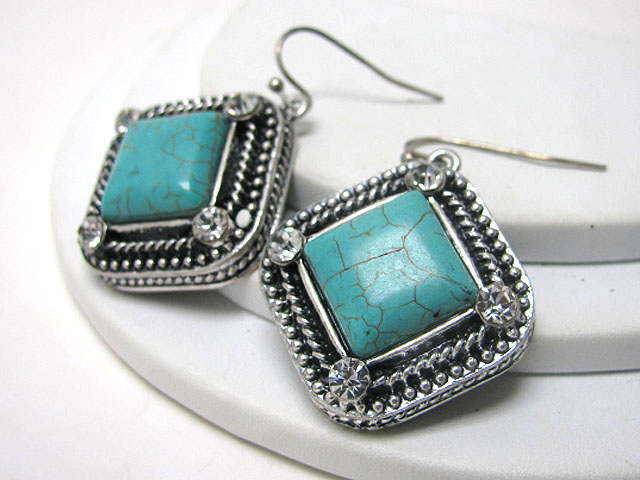 Turquoise accent textured metal earring