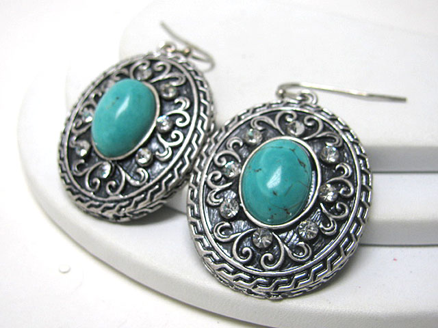 Turquoise accent textured metal earring