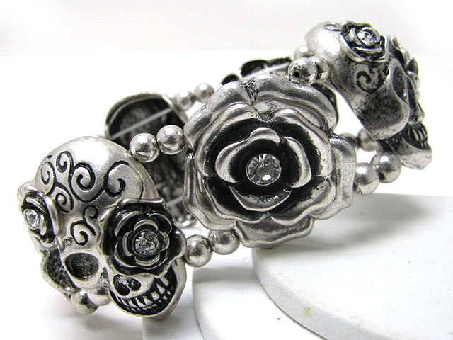 Crystal stud skull and flower link stretch bracelet