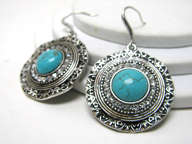 Turquoise accent textured metal earring