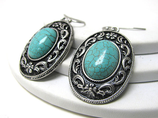 Turquoise accent textured metal earring