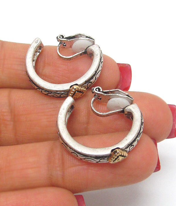 Metal textured hoop clip on earrings 