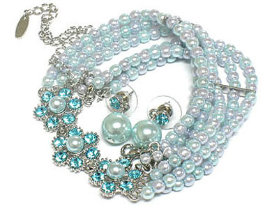 Triple layer pearl and crystal flower necklace and earring set