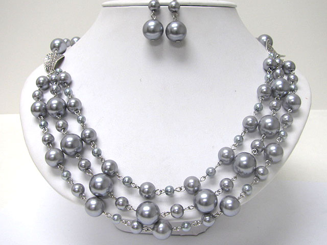 Triple strand pearl long necklace earring set