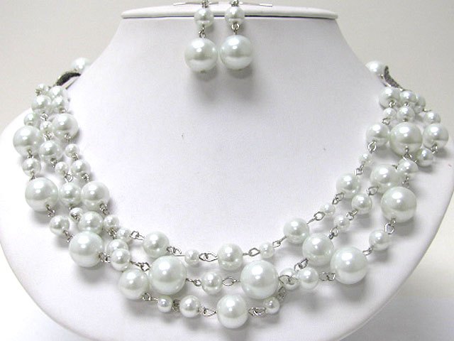 Triple strand pearl long necklace earring set