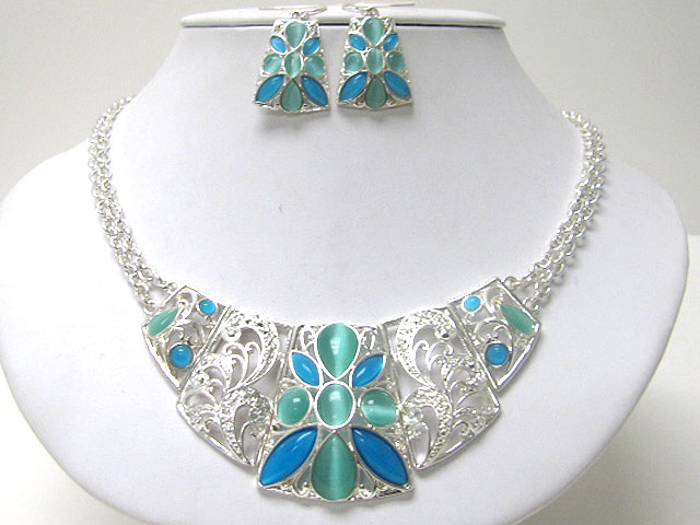 Flower accent filigree metal bib style necklace earring set