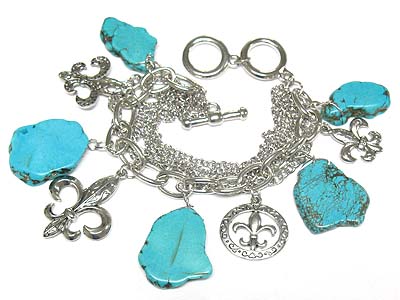 Turquoise stone and metal fleur de lis charm multi chain bracelet