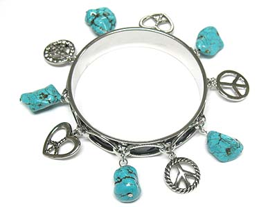 Turquoise stone and peace mark charm dangle round metal bangle