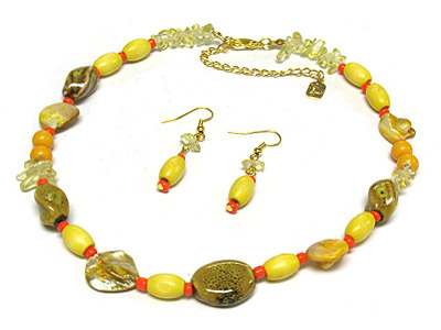 Figurine and acyrlic and glass beads necklace and earring set 