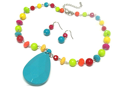 Large acrylic tear pendant and facet cut bead necklace and earring set 