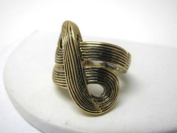 Architectural burnish metal textured stretch ring