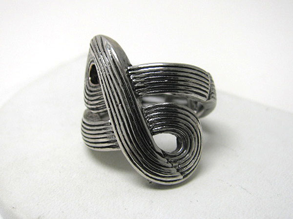 Architectural burnish metal textured stretch ring