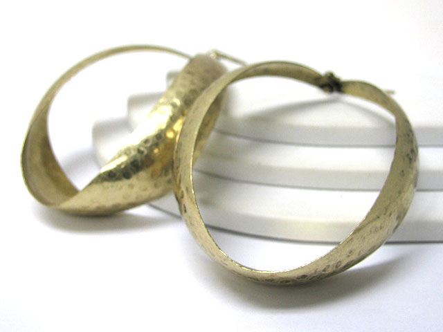 Twisted hammered metal hoop earring - hoops