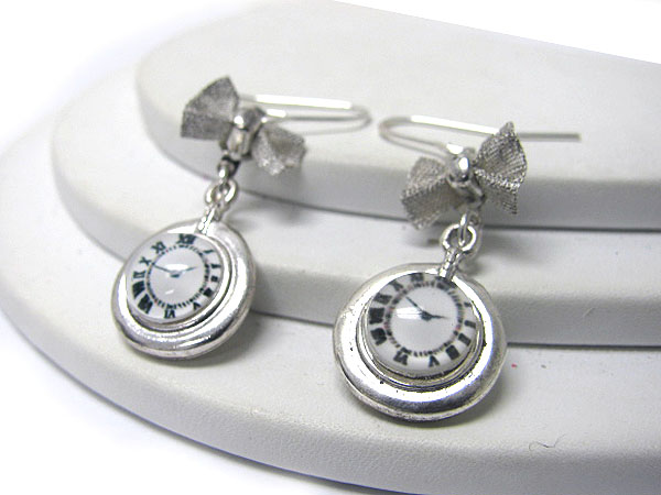 Metal ribbon and watch deco earring