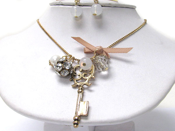 Crystal stud ball and key necklace earring set