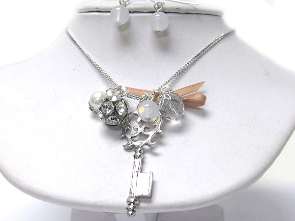 Crystal stud ball and key necklace earring set