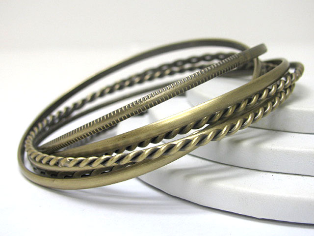 Multi row stackable mixed metal bangle set