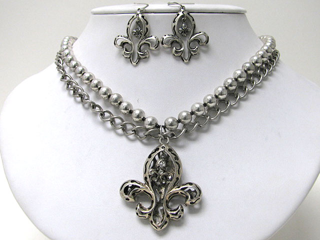 Fleur de lis cut out metal pendant multi chain neckale earring set