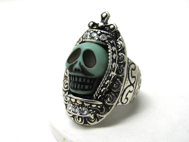 Crystal stud skull scultured metal stretch ring