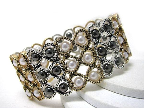 Multi metal ribon and pearl link stretch bracelet