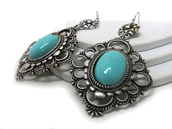 Turquoise accent textured metal earring