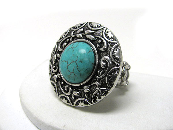 Turquoise accent textured metal ring