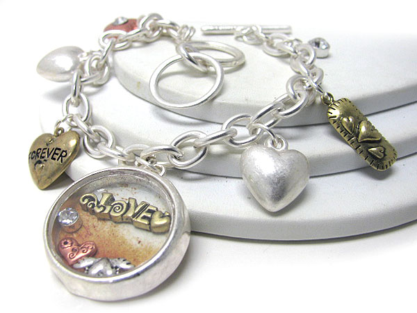 Moving crystal in love disk charm toggle bracelet