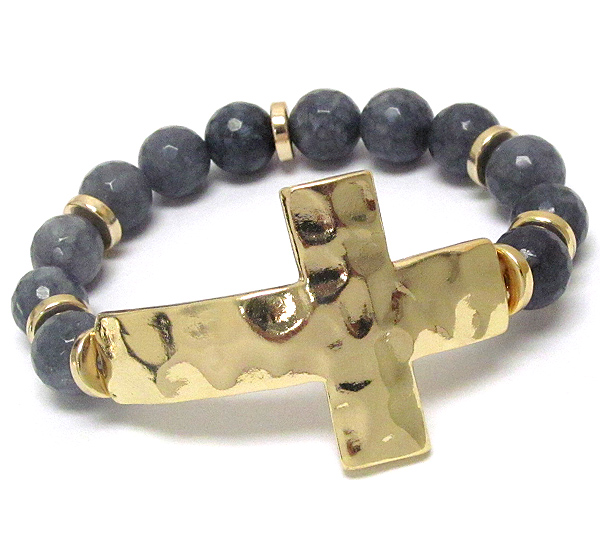 Hammered and curved cross and glass ball stretch bracelet