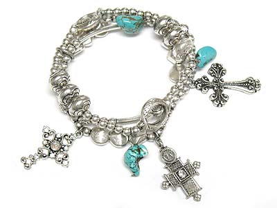 Turquoise stone and metal cross charm stretch braceelt