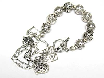 Metal filigree heart charm stretch bracelet