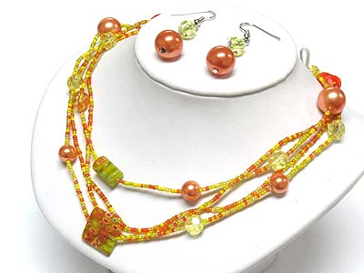 Flower fossil pattern disk and seed beads long neckalce and earring set