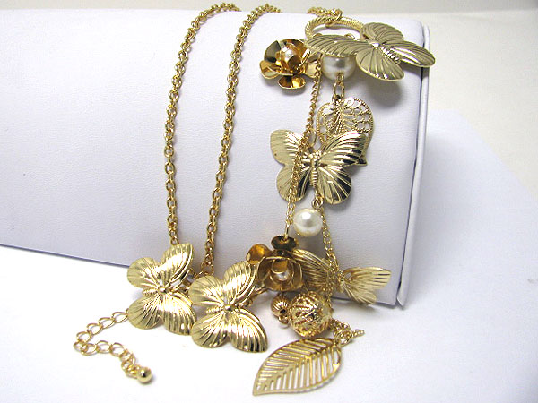 Multi metal butterfly and flower hanging long necklace earring set