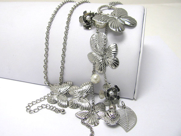 Multi metal butterfly and flower hanging long necklace earring set