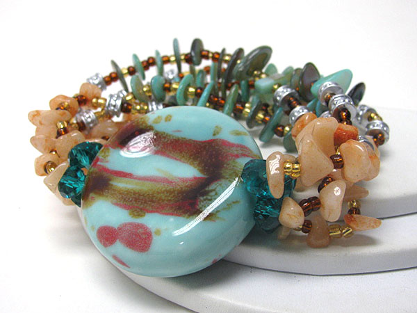 Large figurine and colored stone bead multi stretch bracelet