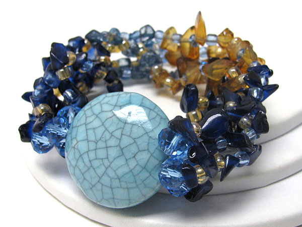 Large figurine and colored stone bead multi stretch bracelet