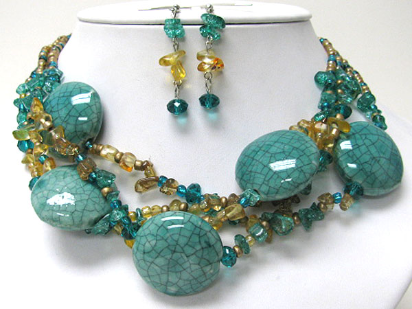 Large figurine and colored stone bead chain necklace earring set