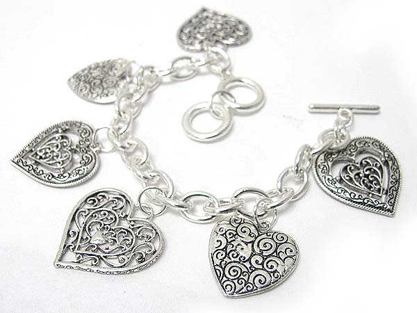 Filigree heart charm toggle bracelet