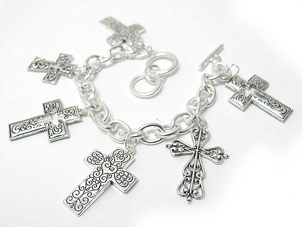 Filigree cross charm toggle bracelet