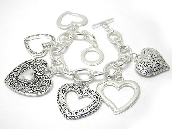 Filigree heart charm toggle bracelet