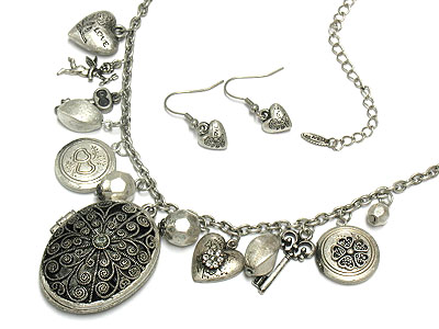 Antique feel filigree metal locket and multi charm dangle necklace