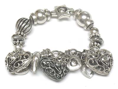 Metal filigree heart charm stretch bracelet