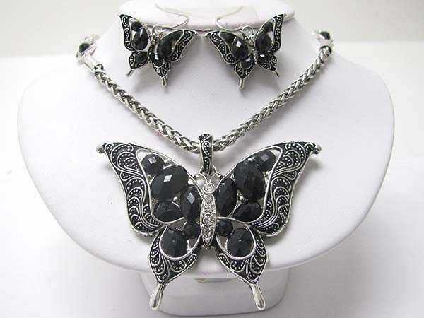 Facet stone and marcasite look metal butterfly necklace earring set?