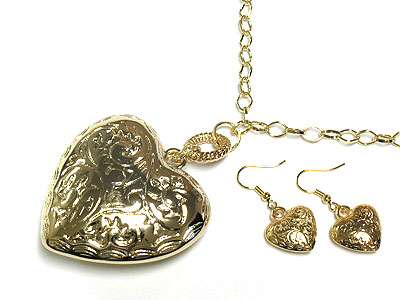 Filigree metal heart necklace and earring set