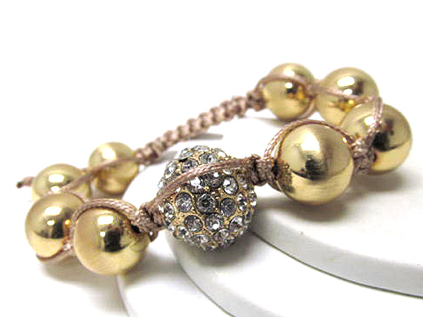 One metal crystal fire ball and multi metal balls braided with cord stretch bracelet