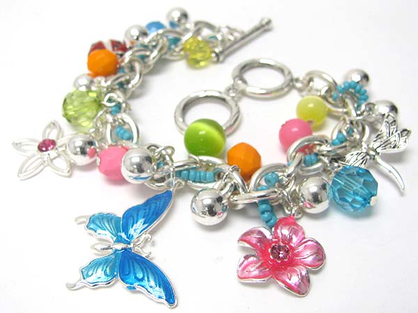 Enamel flower and butterfly charm toggle bracelet